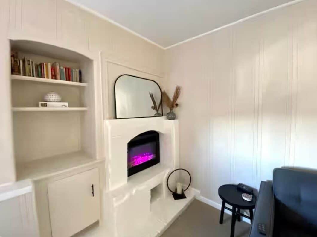 Cozy Garden Suite with Peloton & Fireplace - Photo 5