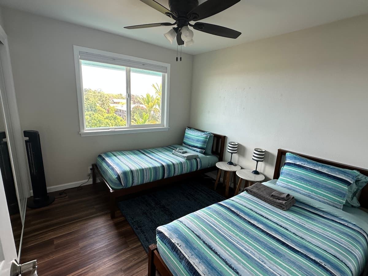 Home in Hilo · ★4.94 · 4 bedrooms · 6 beds · 3 private baths - Photo 4