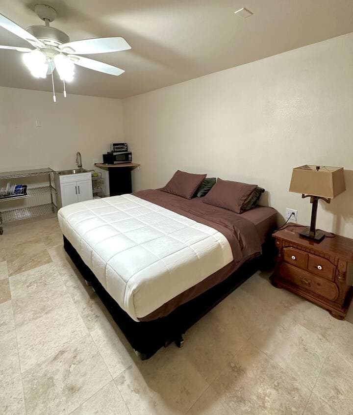 Queen Bed and bathroom at Kona Joe Coffee - Photo 2