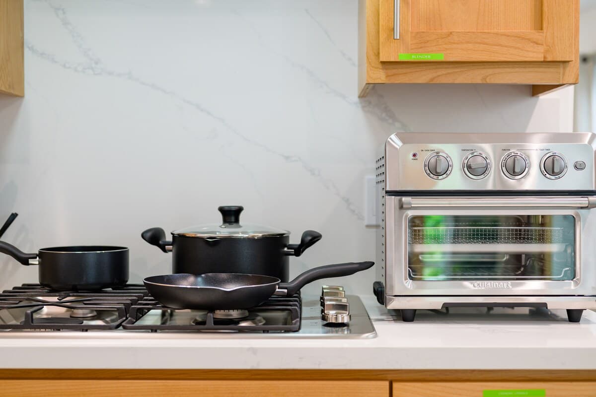 Charming Duplex with Smart TVs & Touch-Free Tech - Photo 2