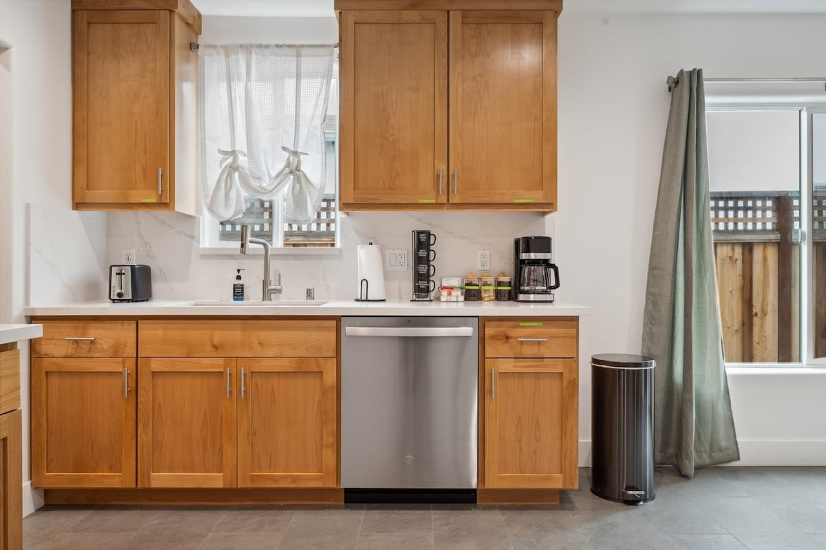 Charming Duplex with Smart TVs & Touch-Free Tech - Photo 4