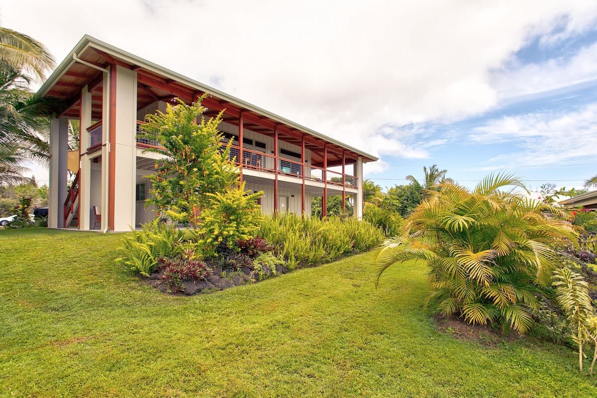 Home in Pahoa · ★4.94 · 2 bedrooms · 2 beds · 1.5 shared baths - Photo 1