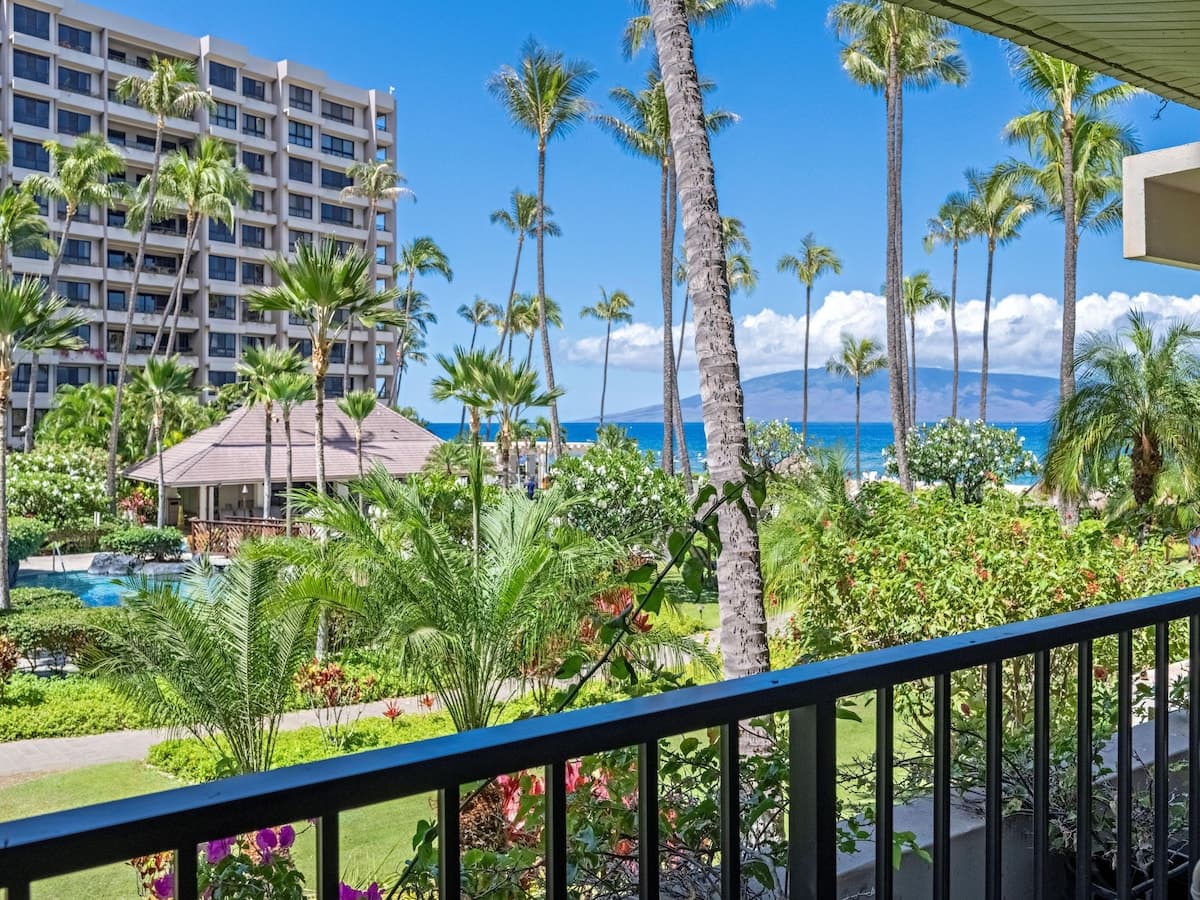 Beach & Pool Views | Prime Location - Photo 1
