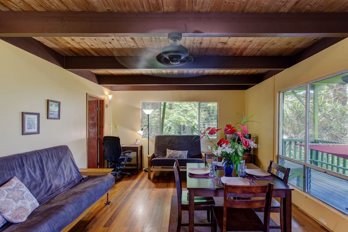 Home in Pahoa · ★4.44 · 1 bedroom · 4 beds · 1.5 private baths - Photo 4